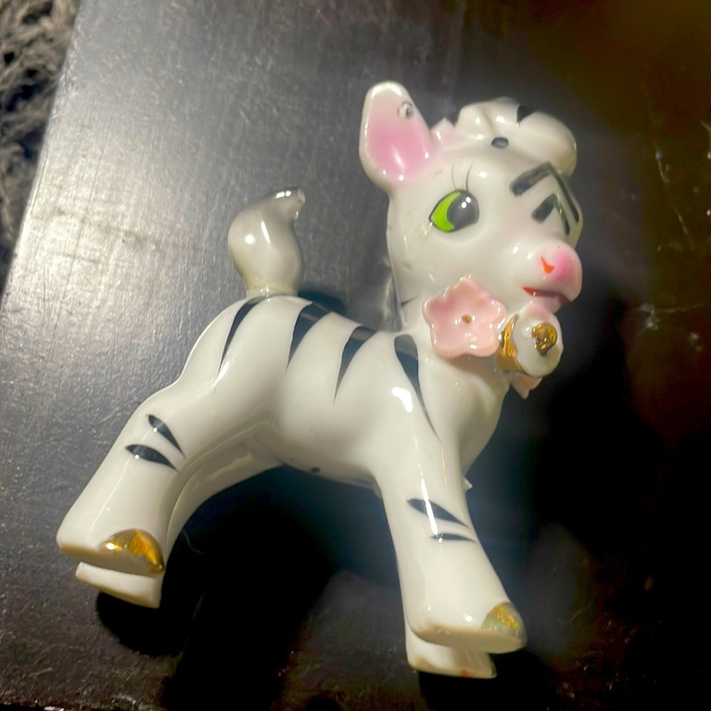Garden spire zebra with flowers attached